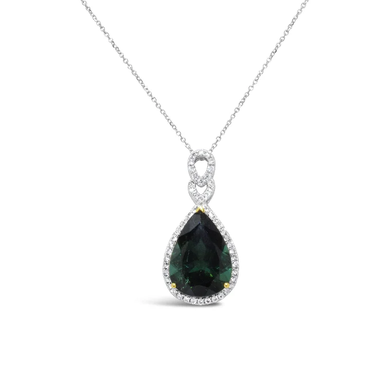 18KT WHITE GOLD GREEN TOURMALINE AND DIAMOND PENDANT.