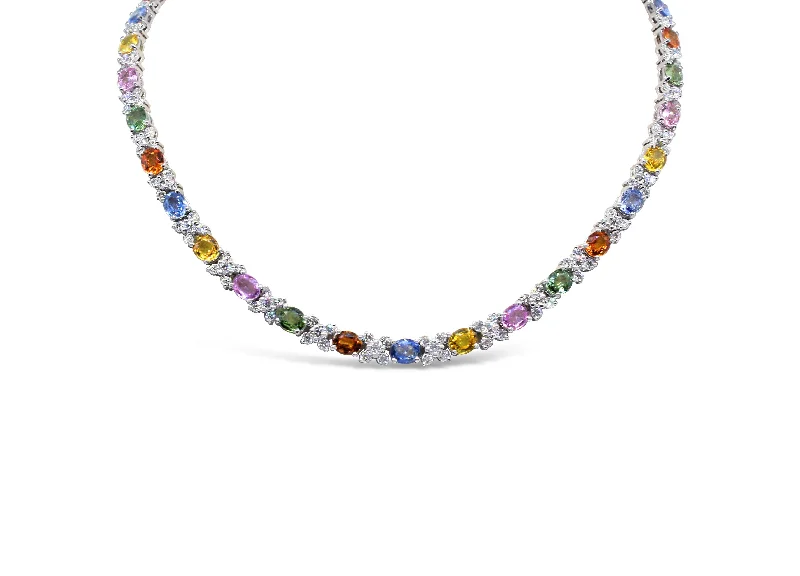 18KT WHITE GOLD SAPPHIRE AND DIAMOND NECKLACE.