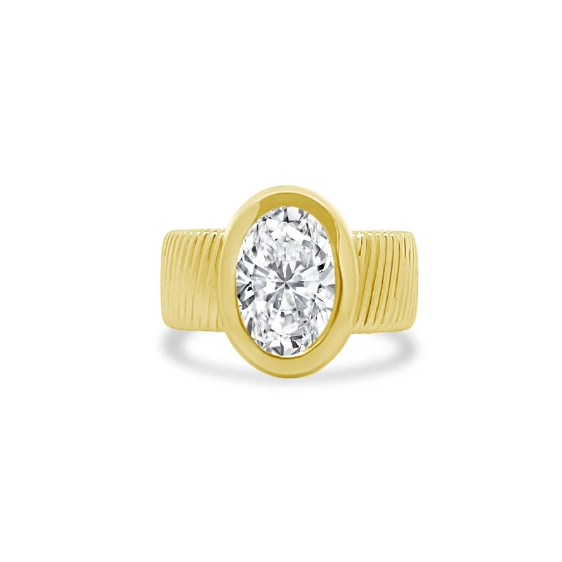 Bezel Set Oval Cut Solitaire on Detailed Gold Band