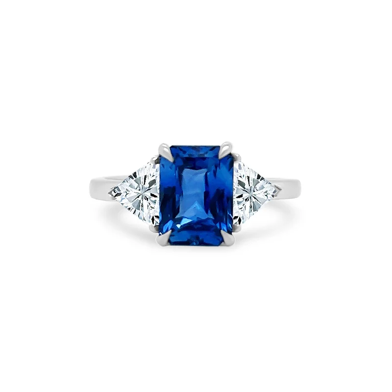 Emerald Cut Sapphire with Trillion Cut Diamond Side Stones